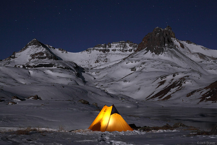 Winter tent at night in the mountains