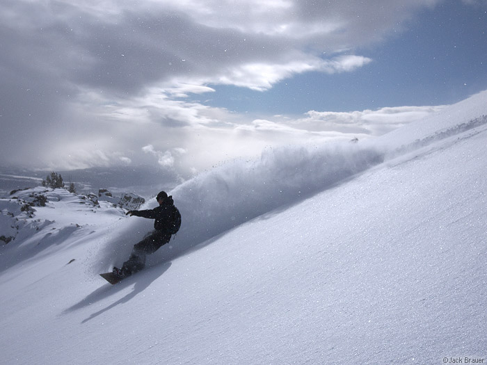 Jason King snowboards