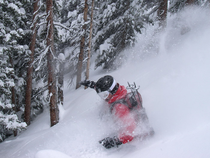 Snowboarding powder in Colorado, May