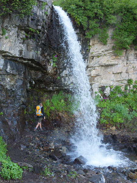 Hiking under a waterfall on Mt. Timpanogos, Utah